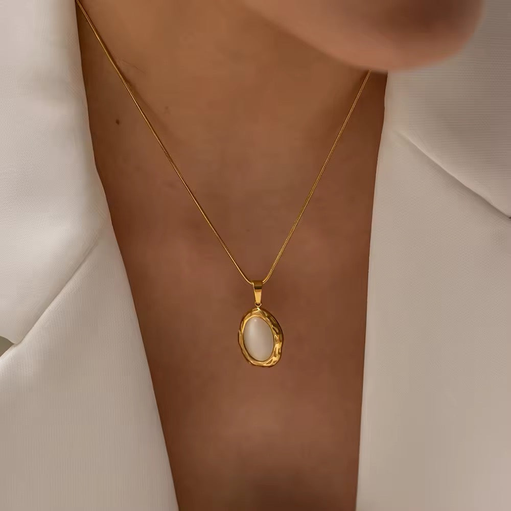 Elegant baroque pearl and cat eye opal stone necklace