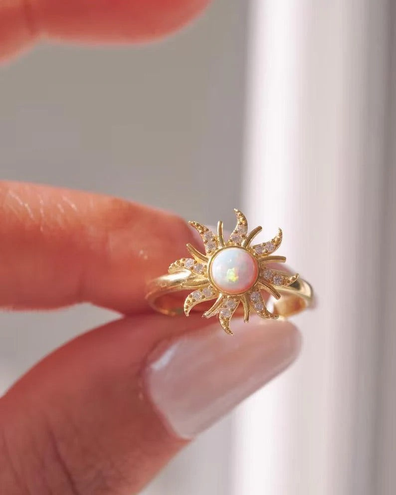 Flat lay of complete jewelry set – necklace, earrings, and crown ring styled elegantly.