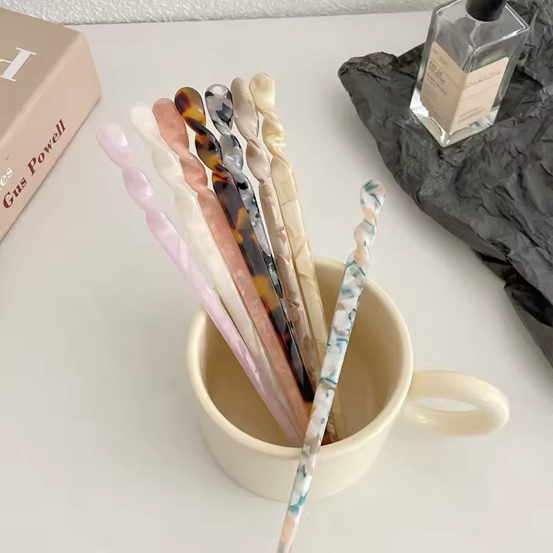 Aesthetic hair stick with a classic marbled acetate design