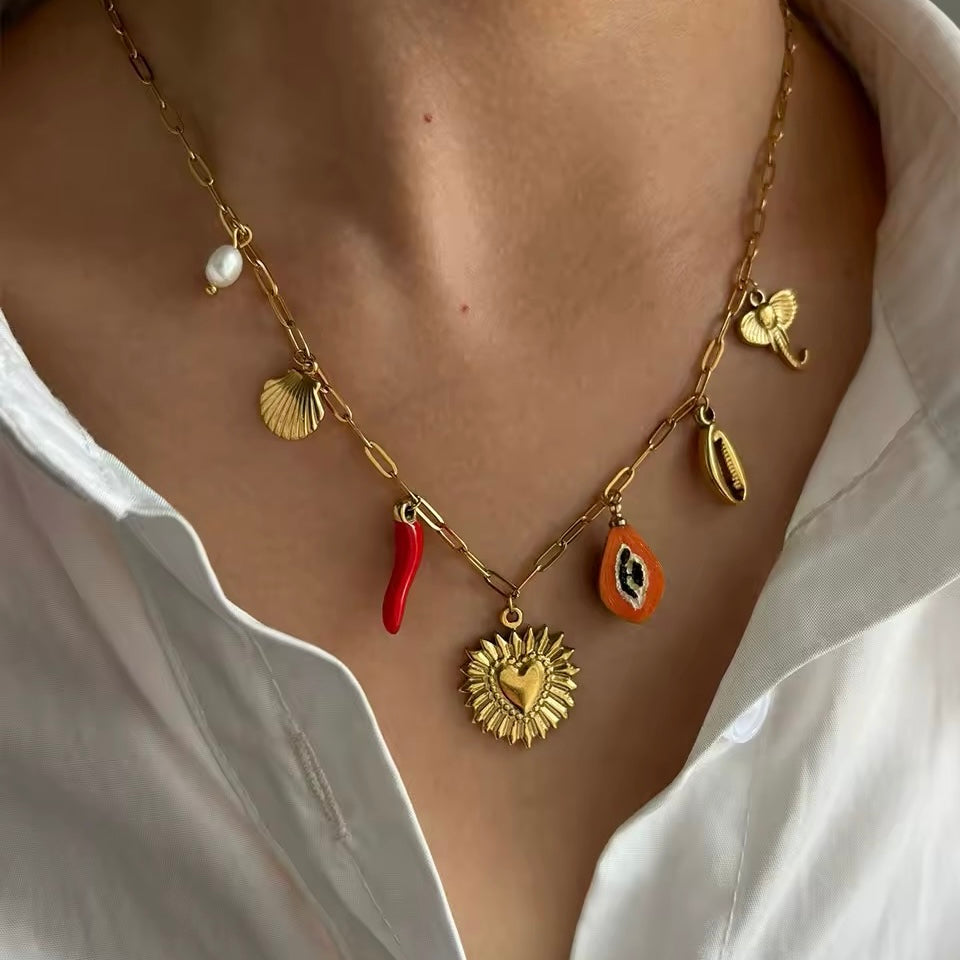 Elegant shell and pearl pendant necklace for beach lovers