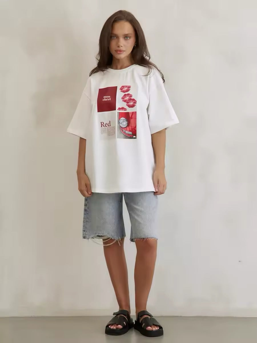 Girl wearing high street red kiss t-shirt with denim shorts aesthetic