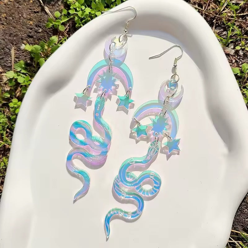 Moon snake earrings made of iridescent acrylic with laser-cut design, combining mystical symbolism and witchy celestial fashion