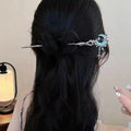Celestial-inspired metal hair stick with an elegant design