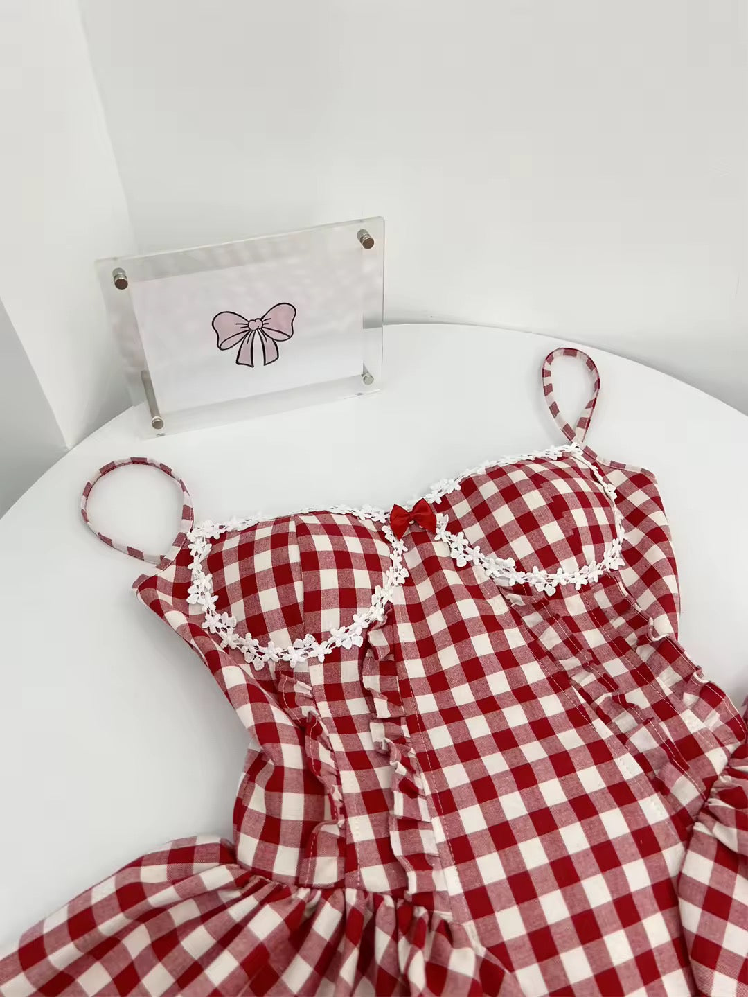 Red plaid mini dress with a flattering fitted design