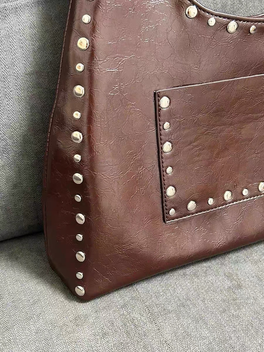 PU leather handbag for women with metal studs and armpit design