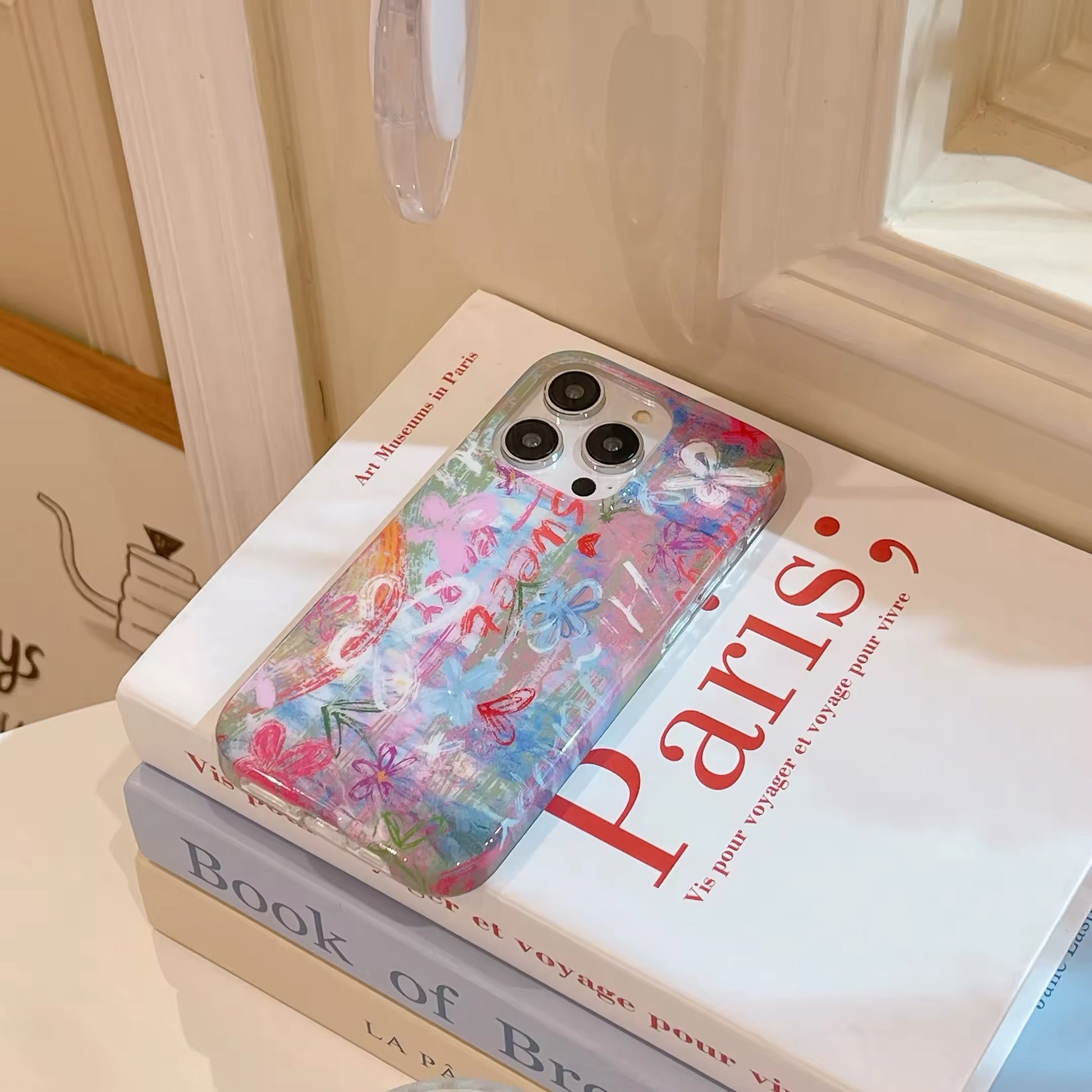 Side view of abstract iPhone case with brush strokes