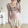 Y2K-inspired pastel pink knitted long sleeve tee