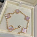Elegant pink clover bracelet with 18K gold-plated finish and soft enamel charm