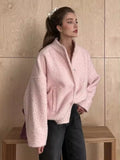 Trendy pink outerwear jacket with warm texture and relaxed fit, Korean aesthetic coat