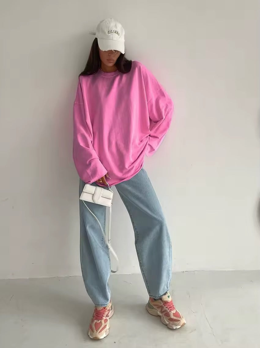 Round neck women’s long sleeve shirt in solid pink color