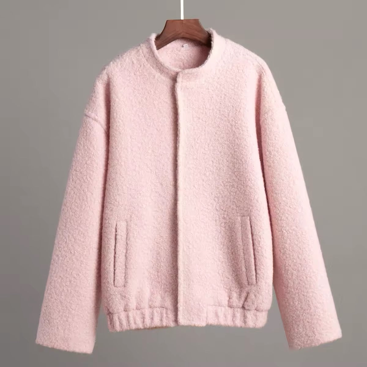 Pink pastel fleece jacket with stand collar and long sleeves, soft girl aesthetic outerwear for cozy winter style