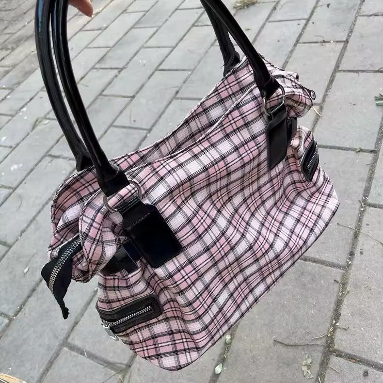 Overhead shot displaying the bag's capacity with daily essentials inside.