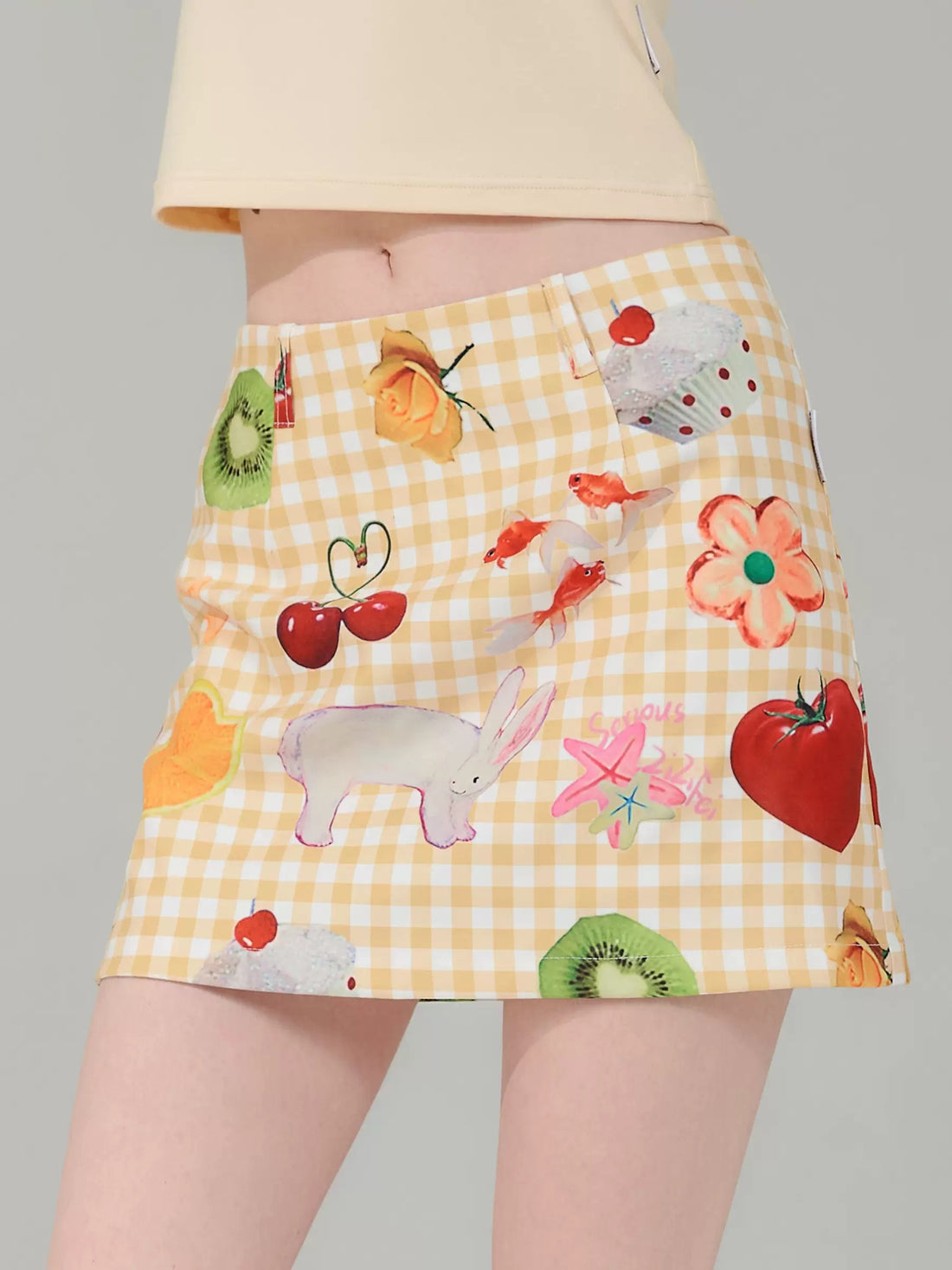 Preppy fruit mini skirt with cute Y2K plaid print in yellow and pink