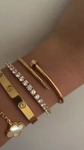 Close-up of the Aesthetic Luxury Bracelet Set featuring 18K gold plated minimalist designs, displayed elegantly on a neutral background.