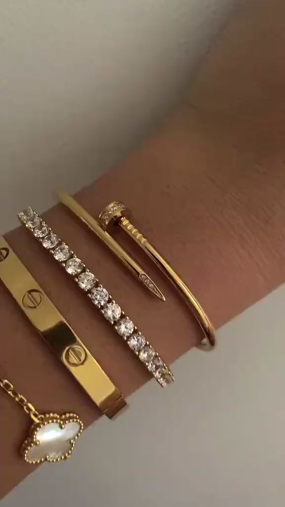 Close-up of the Aesthetic Luxury Bracelet Set featuring 18K gold plated minimalist designs, displayed elegantly on a neutral background.