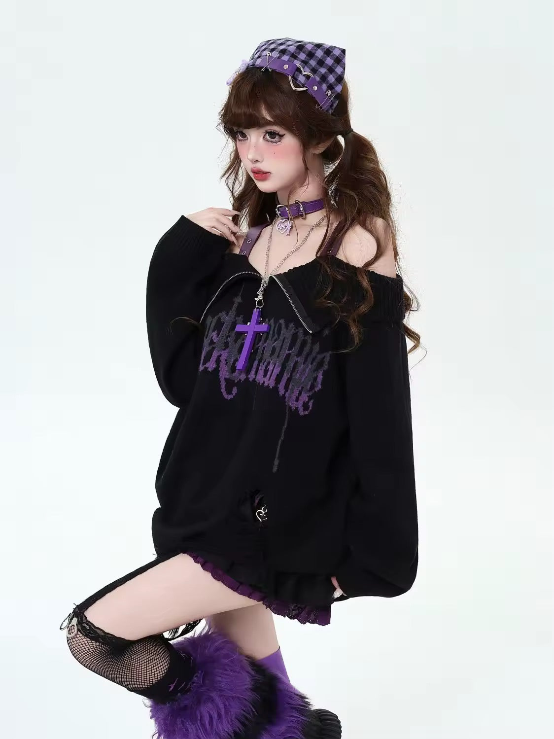 Punk inspired gothic pullover with graphic elements and buckle strap