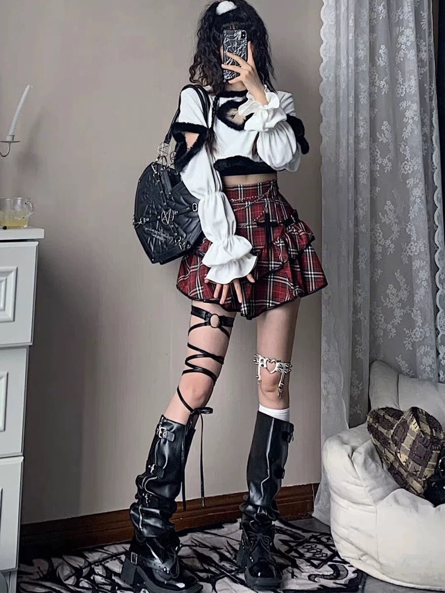E-girl red plaid mini skirt with high-waisted ruffle details for punk and gothic fashion lovers