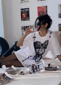 Loose cotton bikini print T-shirt for women, edgy and fun fashion statement piece perfect for summer outings and viral fashion moments