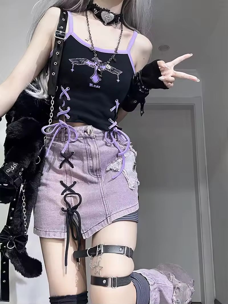 Side angle of skirt with grunge accessories and edgy leg harness styling