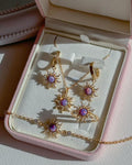 Close-up of Rapunzel-inspired opal sun pendant necklace with intricate zircon details.