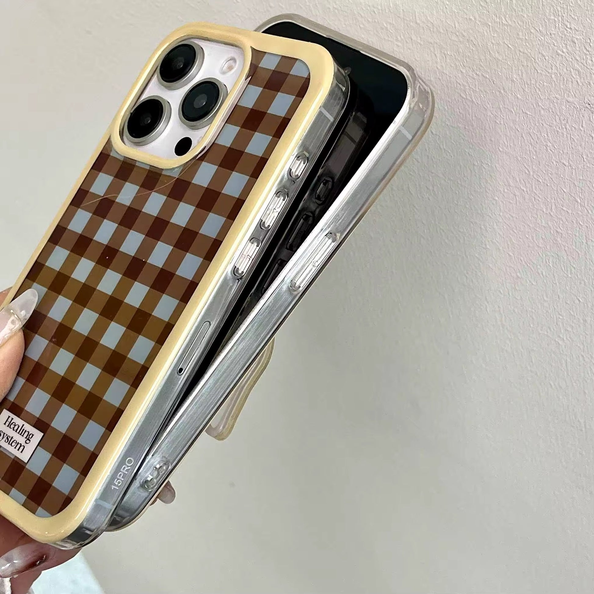 Side profile highlighting the slim TPU construction and checkered pattern