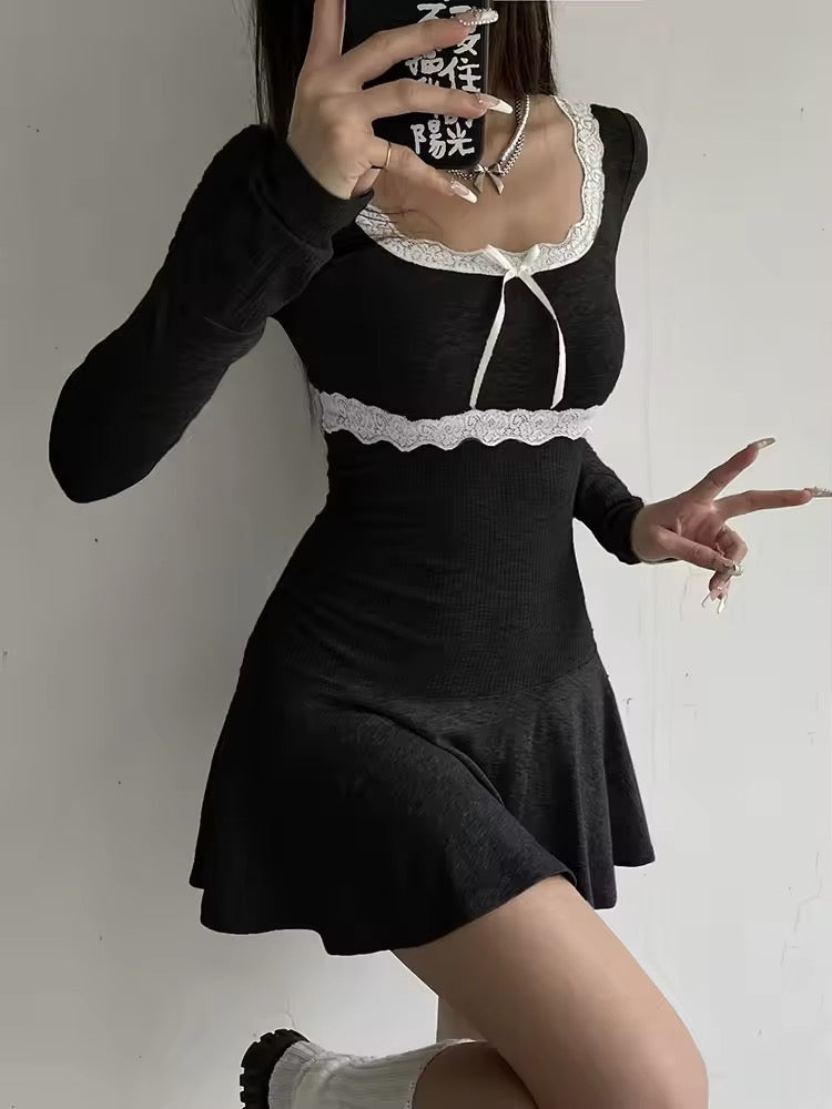 Soft knitted dress featuring romantic lace-trimmed sleeves