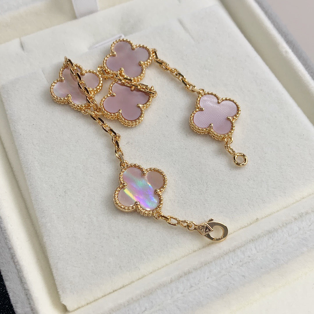 Stackable pink clover bangle for gifting or everyday elegance