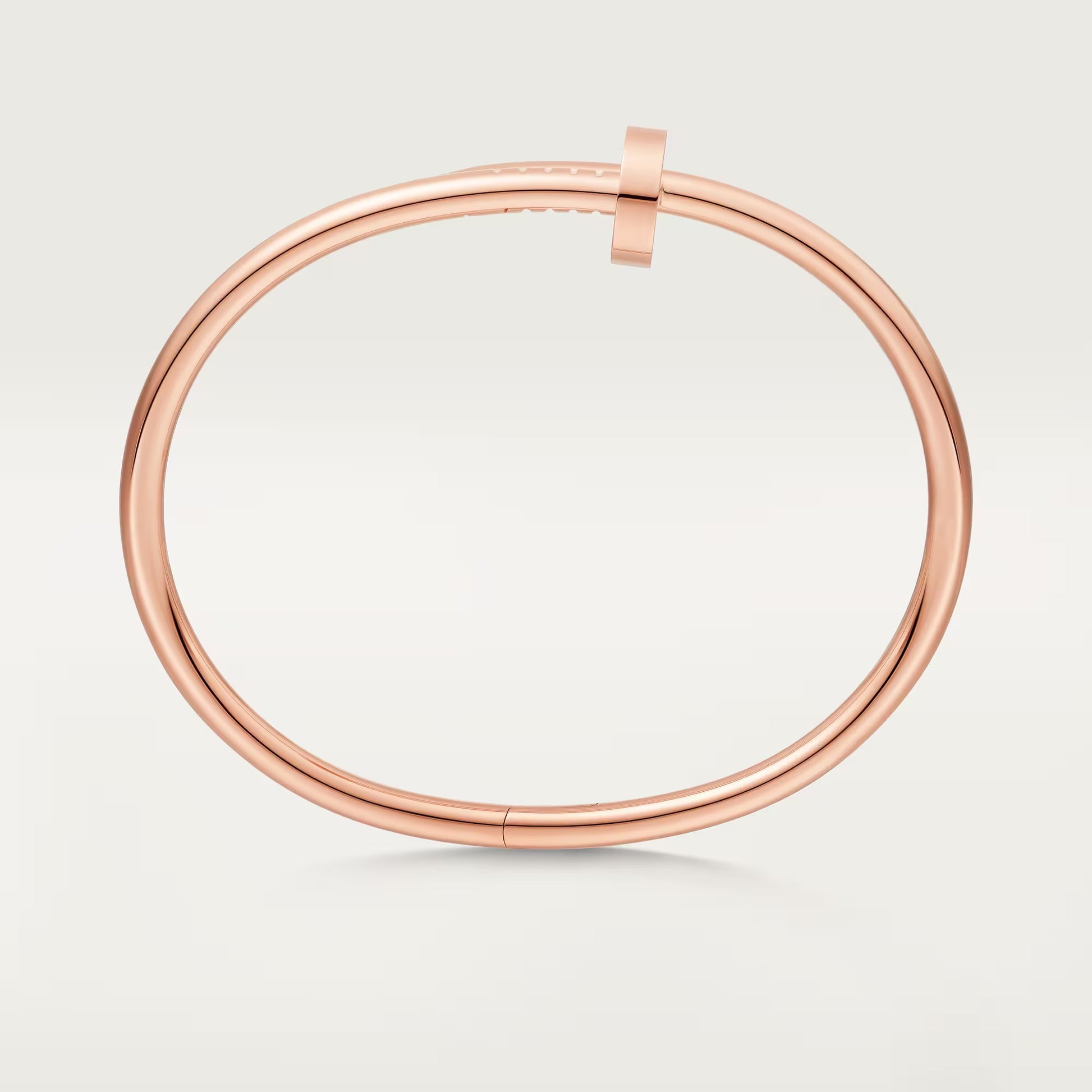 Designer rose gold bangle with soft glow and durability