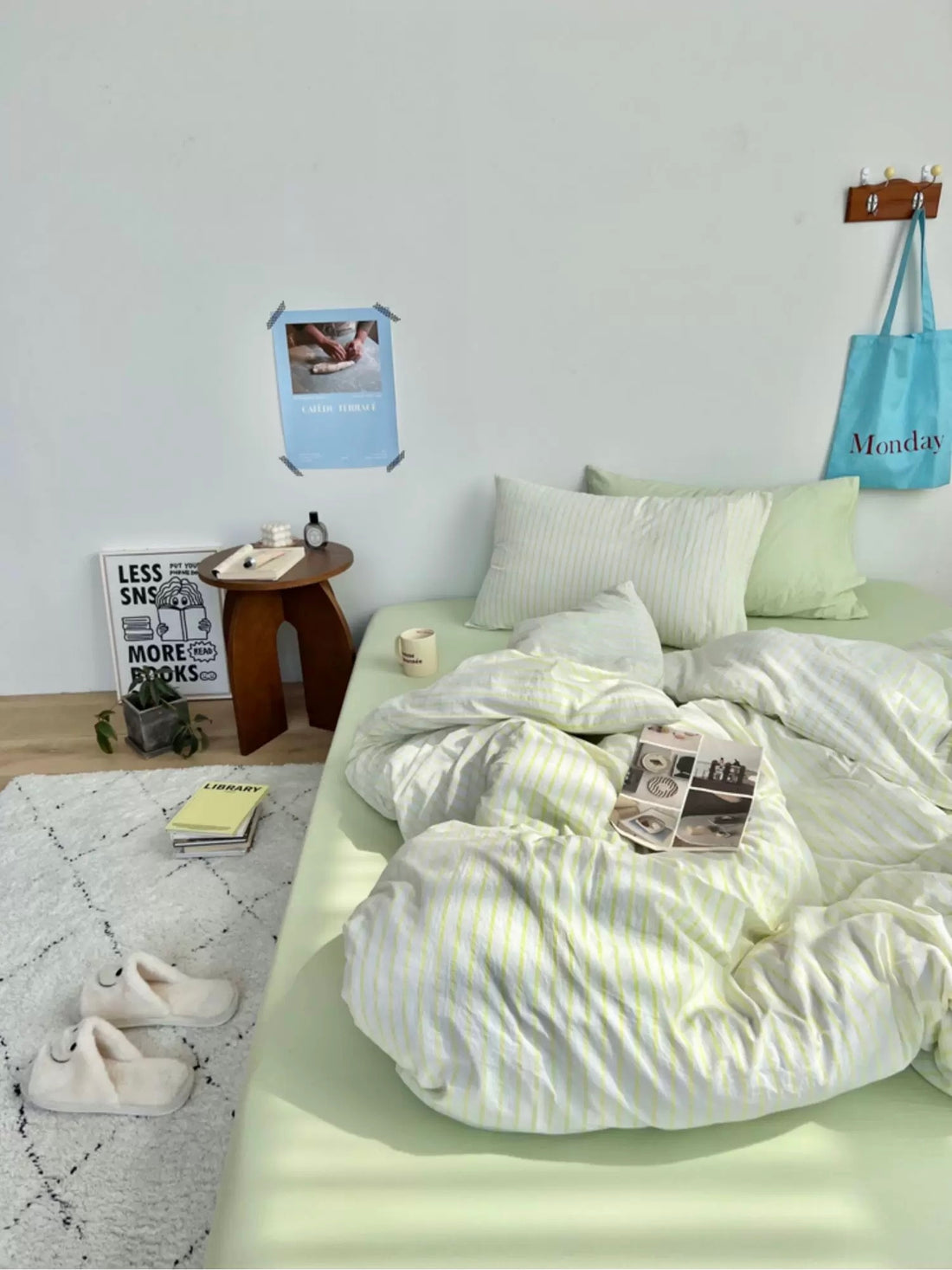 Bedroom with a neatly made bed and minimal decor
