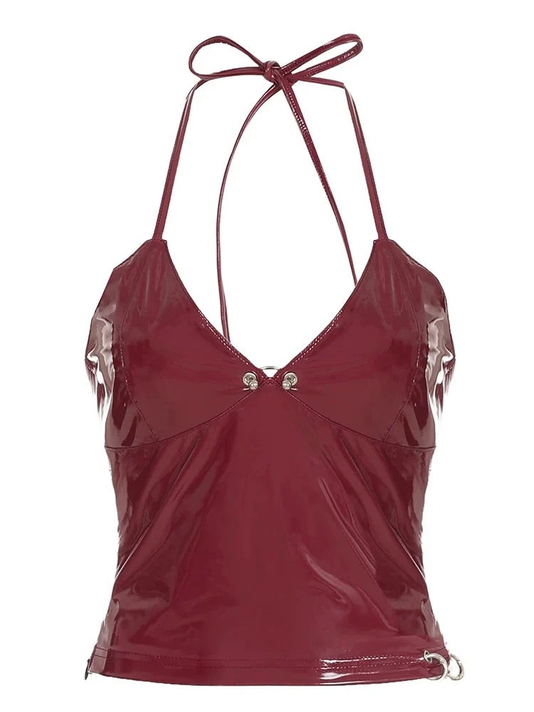 Punk-inspired leather camisole with metal button accents