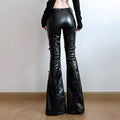 Low-waisted gothic PU leather pants, Y2K-inspired flared trousers with buckle strap details, perfect for streetwear, punk, and alternative fashion outfits
