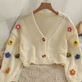 Soft girl cardigan with colorful floral embroidery