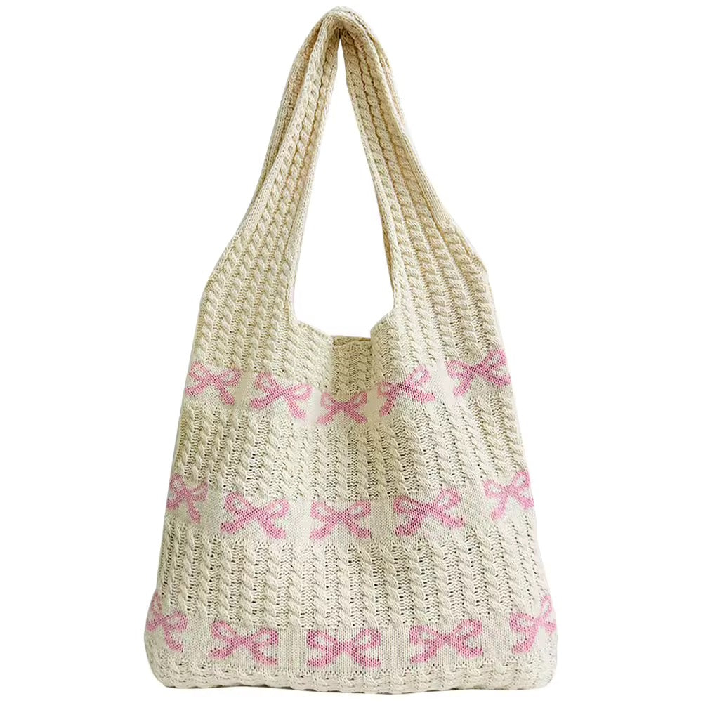 Front view of the Soft Girl Beach Bag showcasing the intricate knitted bow pattern.