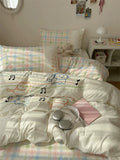 Bedding set with cartoon design on a bed in a room.