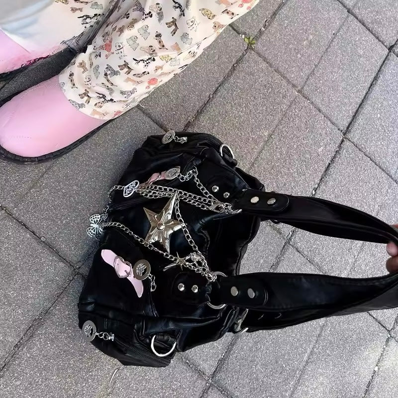 Side view of punk-style spicy girl tote bag with butterfly charm