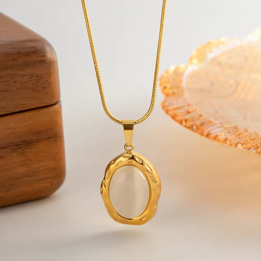 Minimalist oval opal pendant necklace in gold-plated design