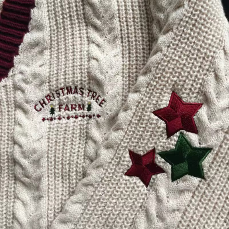 Star embroidered knit sweater styled for festive streetwear