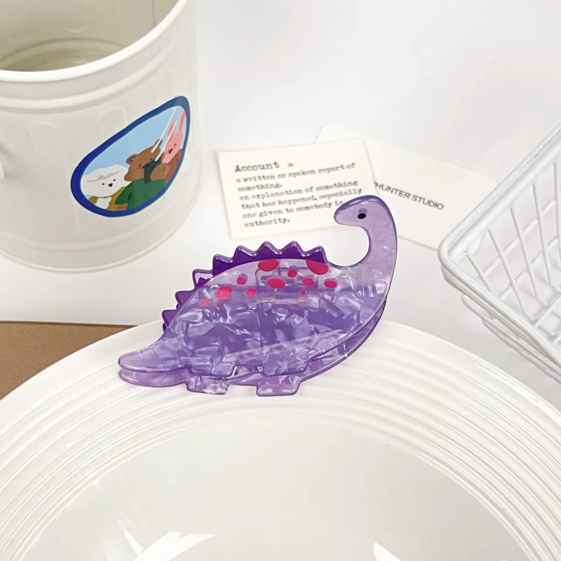 Adorable dinosaur hairpin with a playful acetate finish
