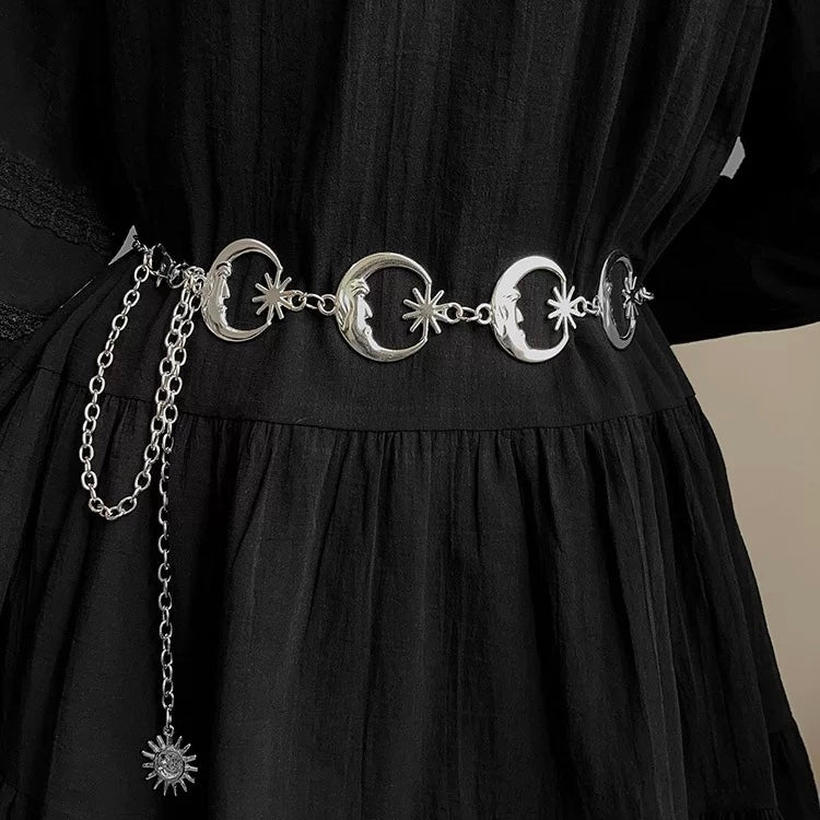 Gothic punk dress styled with gold moon belt featuring celestial pendants