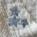 Star embroidered aesthetic cardigan layered over dress