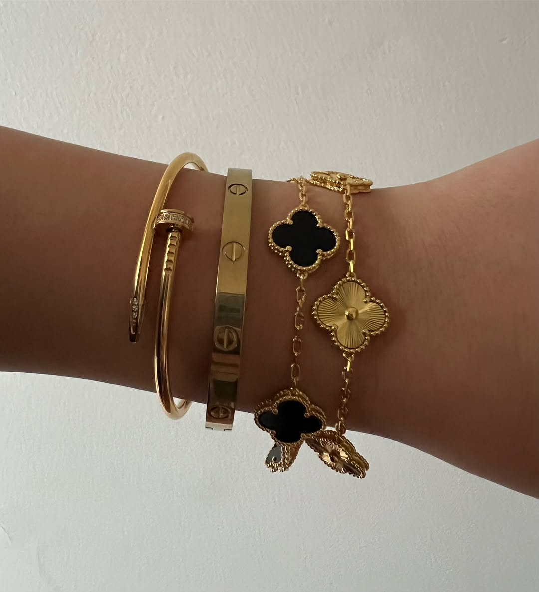 Black Clover Bracelet in soft lighting emphasizing its bold contrast and sophisticated aesthetic.