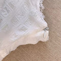 Side view of layered coquette mini skirt
