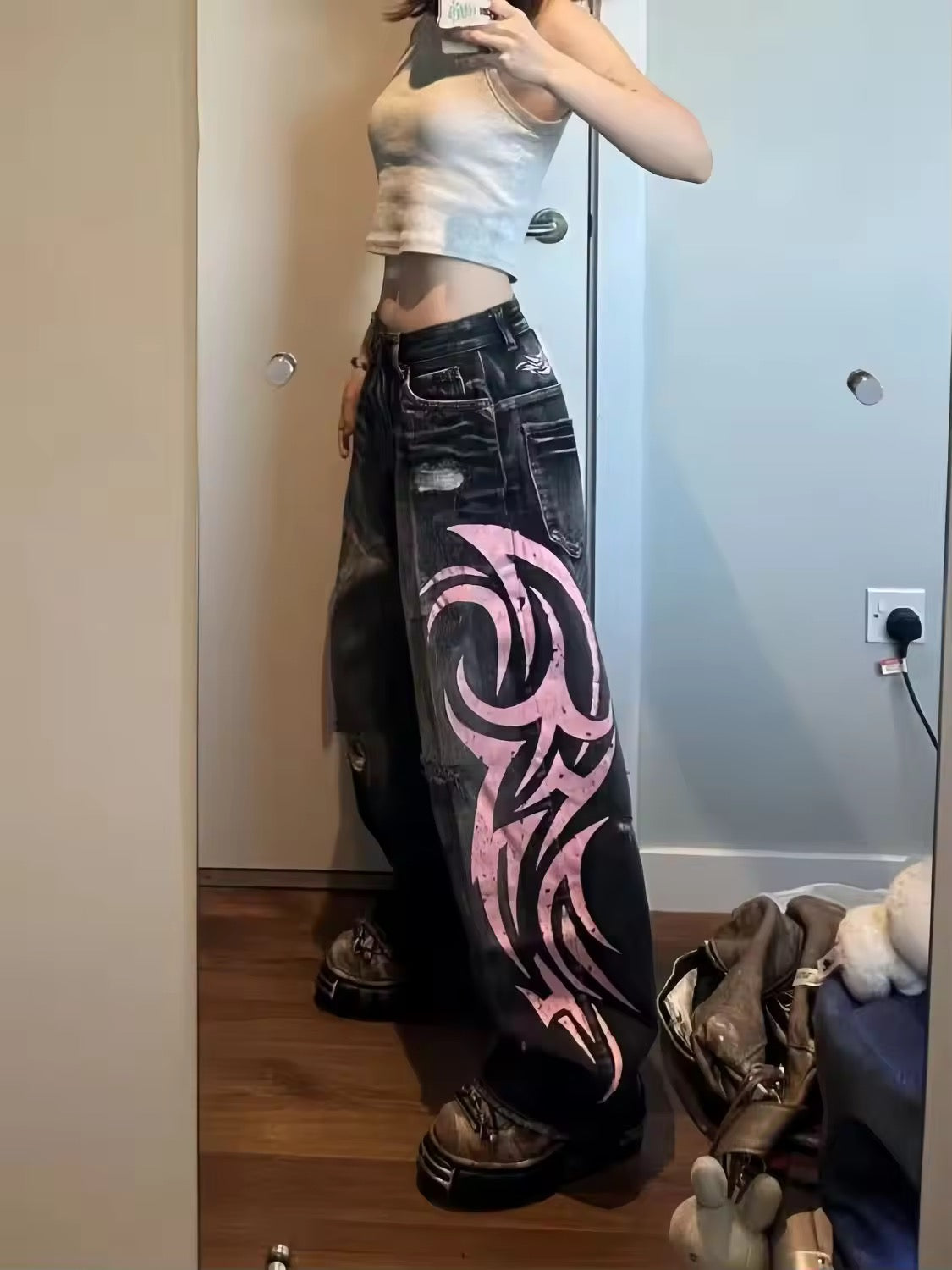 Low rise flare jeans styled for Harajuku streetwear look