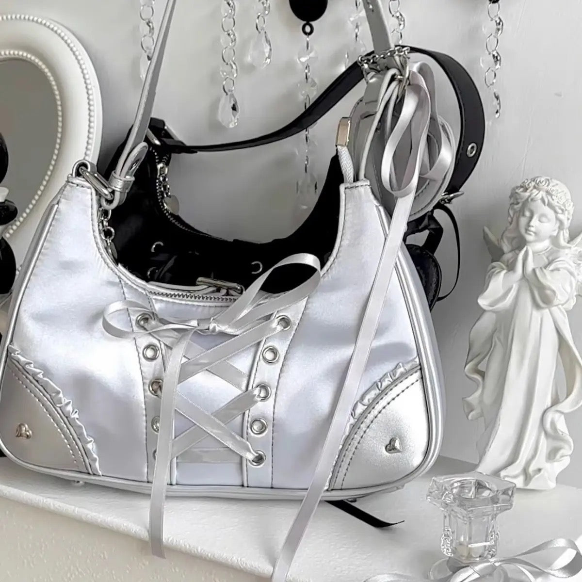 Kawaii clear shoulder bag with bow, matched with grunge boots and ballet flats for mixed aesthetics