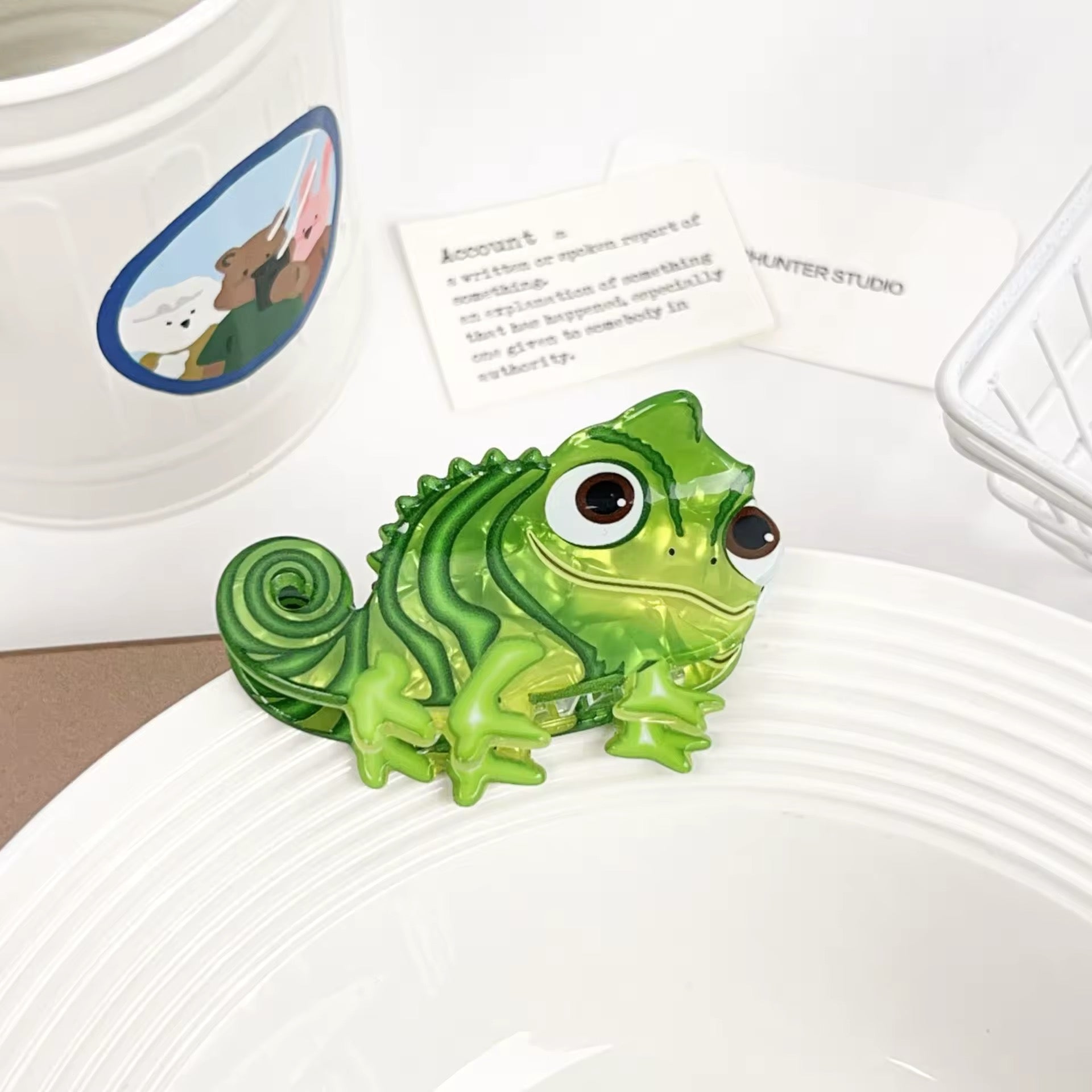 Quirky fashion hair accessory featuring a chameleon design.