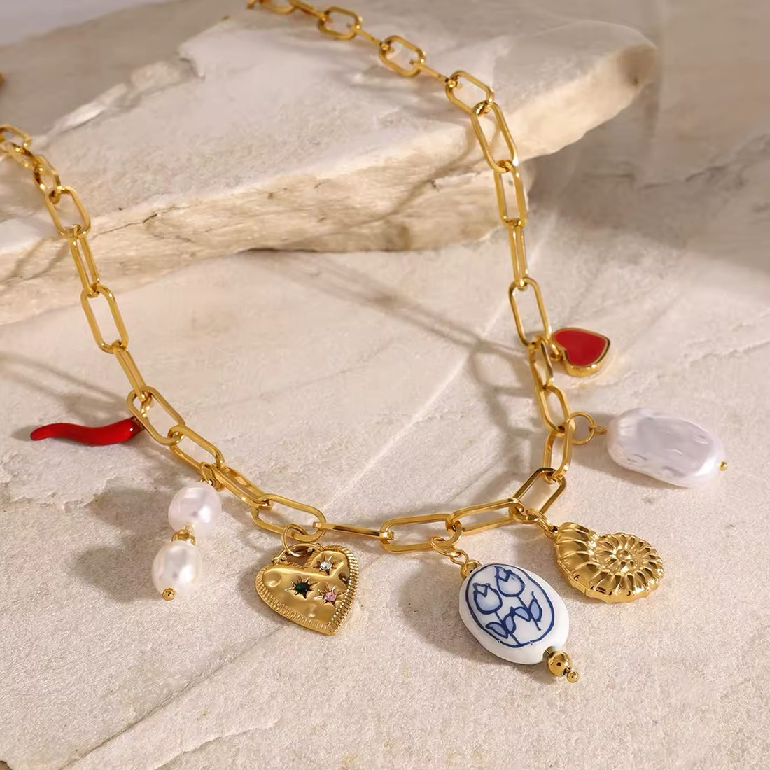 18K gold-plated charm necklace with pearl and conch pendant