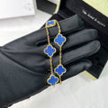 Designer clover bracelet with pastel blue and gold contrast
