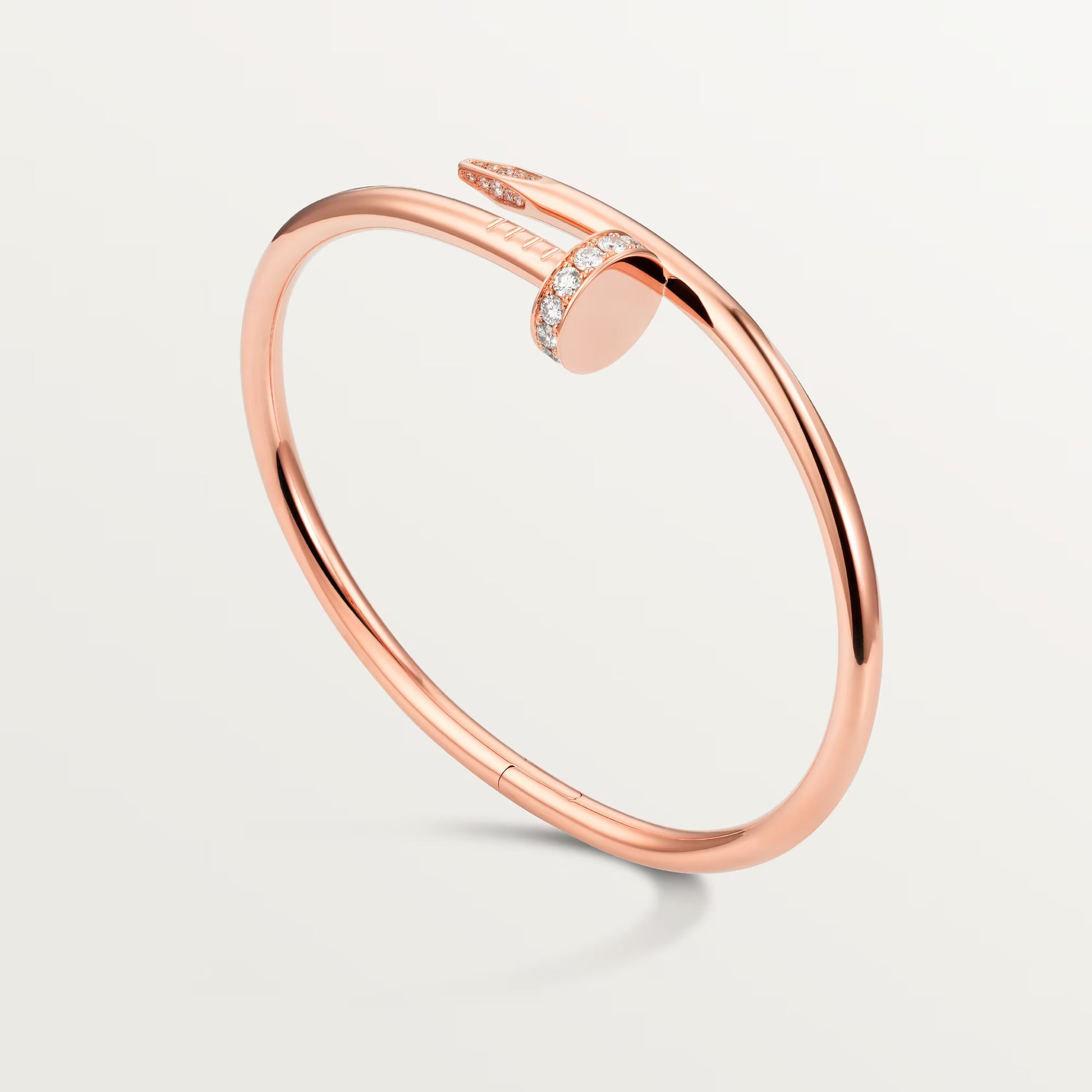 Bold gold nail bracelet with crystal highlights, aesthetic and edgy