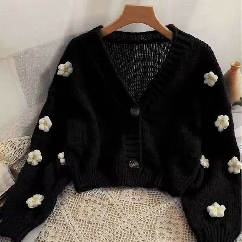 Cozy aesthetic sweater with soft flower design