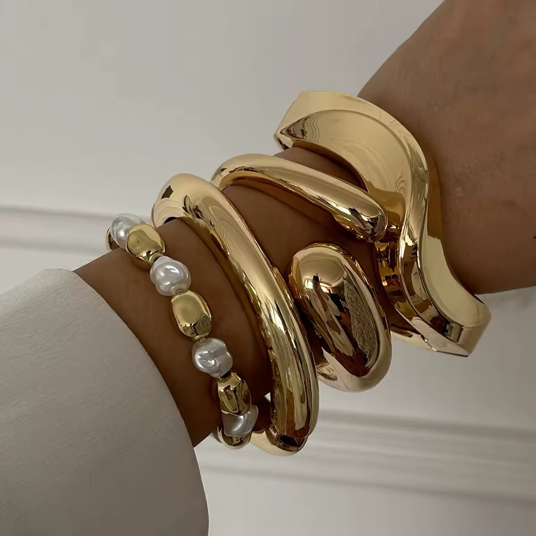 Vintage bohemian bracelet with a wide cuff design in gold